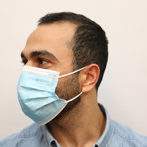 A man wearing MedSense Disposable Face Masks with Ear Loops (FMR5) 