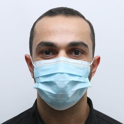 A man wearing the MedSense Disposable Face Masks with Ear Loops (FM1)